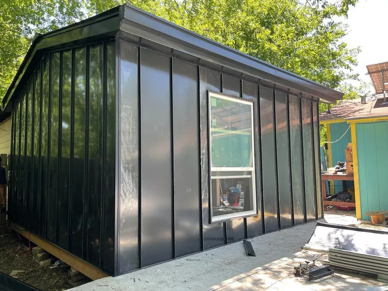 Black standing seam metal wall panels for Roof Inspection in Perry